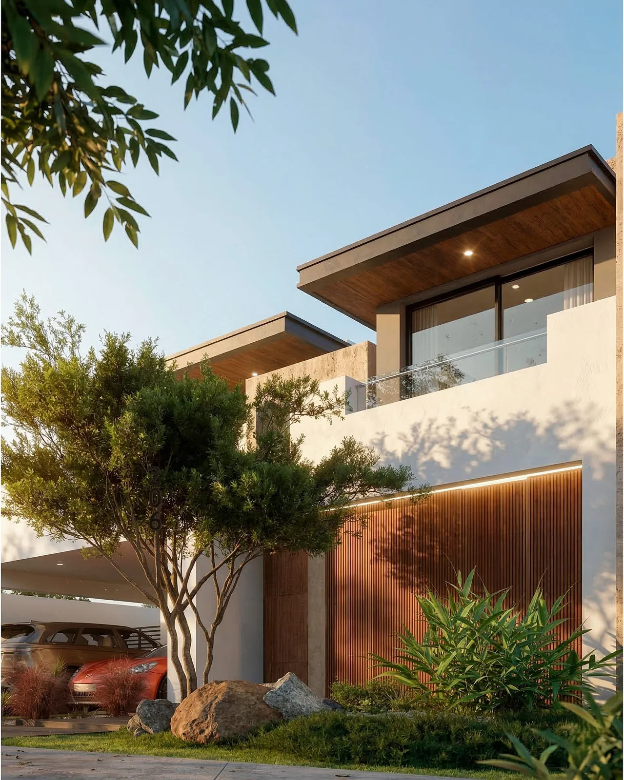 Fachada de arquitectura residencial contemporánea con vegetación y materiales naturales